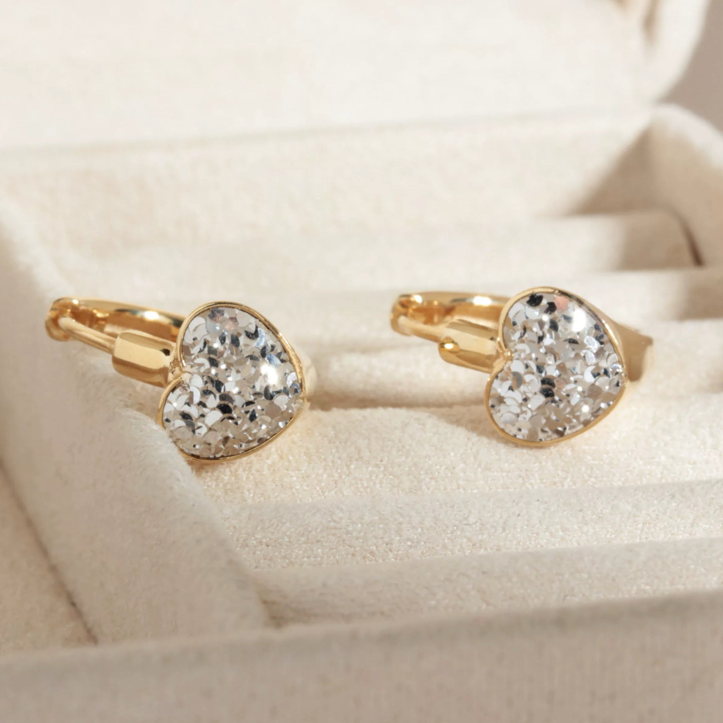 Two tone heart earrings